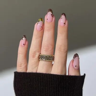 maroon and gold chrome french nails