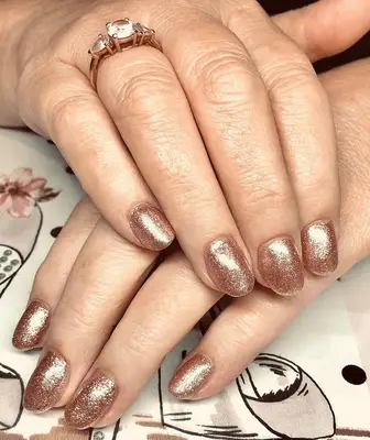 short acrylic manicure with metallic rose gold