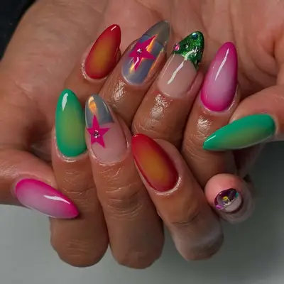 Detailed manicure with colorful and unique designs on fingernails