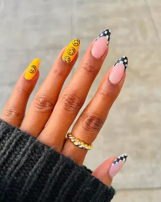 A graphic take on the black French manicure. 