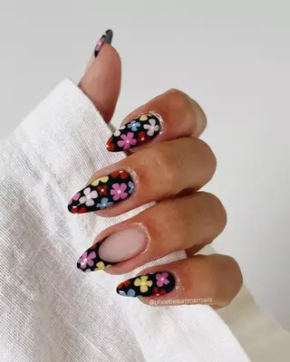 A flower-painted French manicure. 