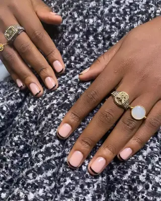 A micro French manicure. 