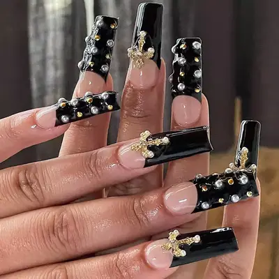 An ornate coffin-shaped manicure. 