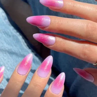 Textured pink and purple aura nails with subtle shimmer