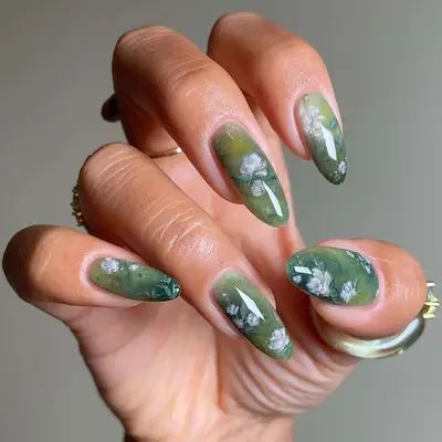 green watercolor nails with floral designs
