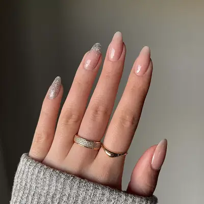 Silver sparkle accent nails with nude base