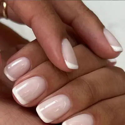 Short French manicure with bubble bath pink.