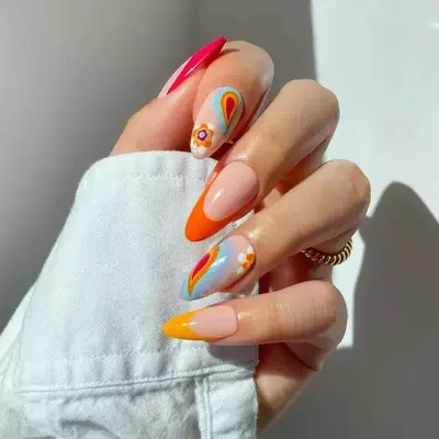 Retro boho bubble bath colored manicure with French nails.