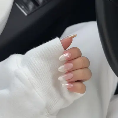 Bubble bath pink ombre nails with chrome finish.