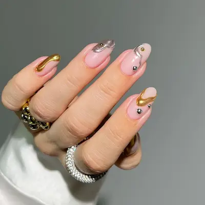 silver and gold 3D gel nails 