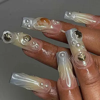 beach nails with gold seashells and pearls