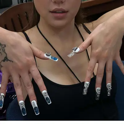 nails with rhinestoned letter charms