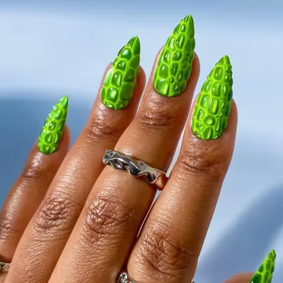 Green manicure with dual-finish and 3D croc effect