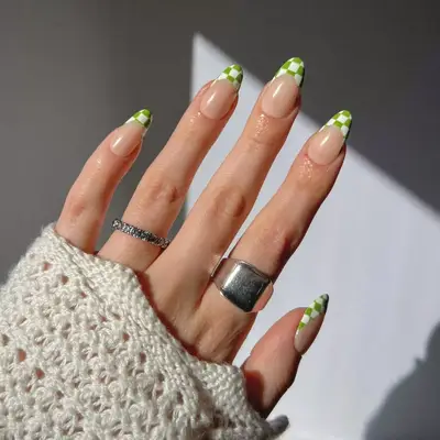 Manicure with green and white checked French tips