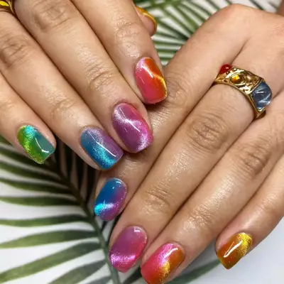 Manicure with rainbow cat eye effect