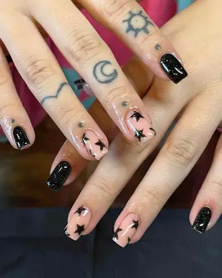 Black glitter star nails