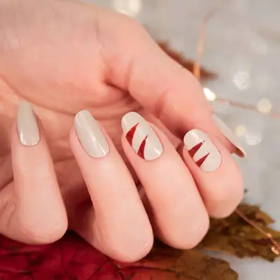 Neutral manicure with minimalist tiger stripe accent nails