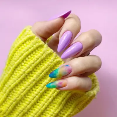 Lavender manicure with watercolor accent nails