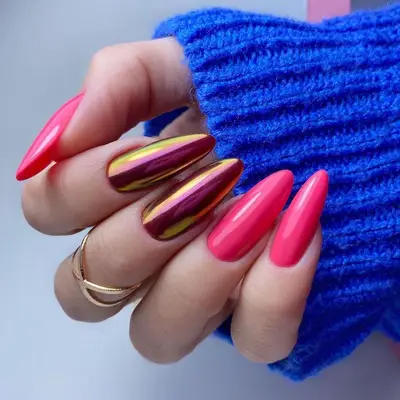 Bright pink manicure with iridescent copper metallic accent nails