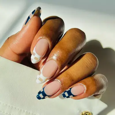 a negative space checkerboard manicure