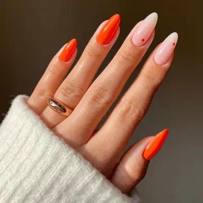 orange nails with dots