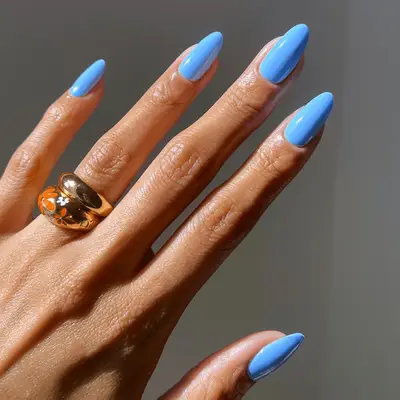 Nail polish bottle labeled Essie Jelly Gloss