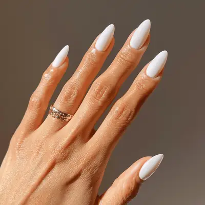 Hand holding Gelcare Rosehip Oil bottle