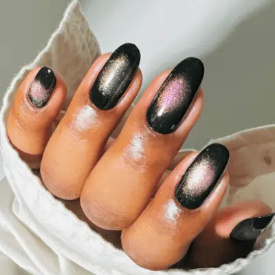 black manicure with velvet shimmery accents