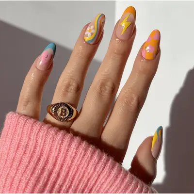 whimsical colorful mismatch heart flower lightening bolt nail art