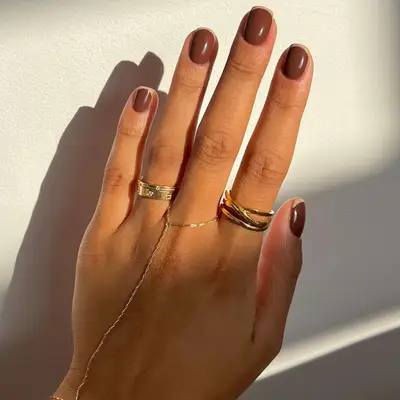 Brown on brown french tip nails 