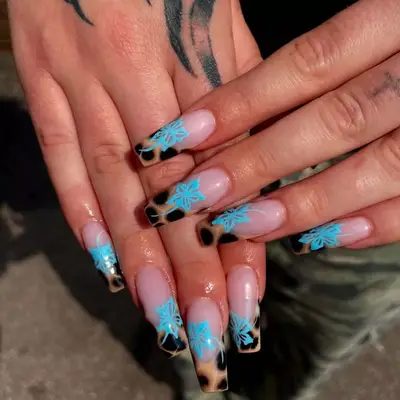 Long square nails with leopard print and blue floral design