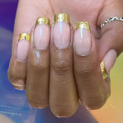 Gold French manicure on sqaure nails