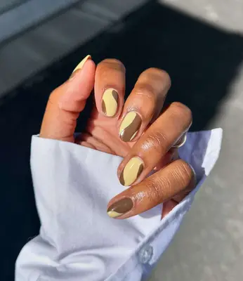 Butter yellow and brown manicure