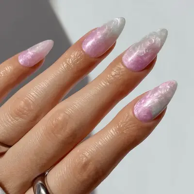 Pearl nail polish swirled with bubblegum pink polish.