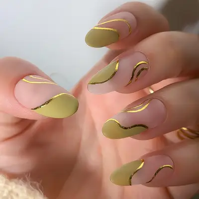 Sage green nails with negative space, gold details, and a matte finish