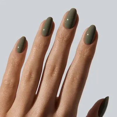 A solid sage green manicure
