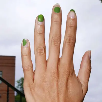 Negative space manicure with sage green.