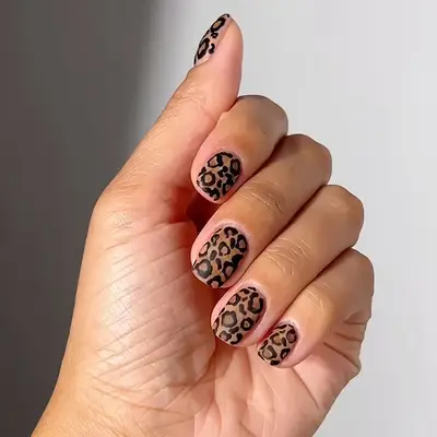 tight leopard print manicure