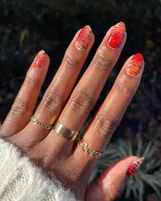 an ombré tiger striped manicure
