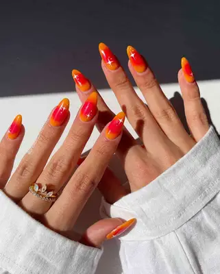a sunset aura manicure 