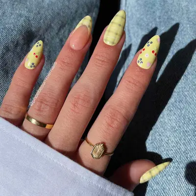 plaid and fruit manicure with an almond medium length shape