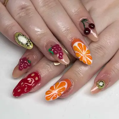 Structure gel fruit manicure with rounded shape and medium length 