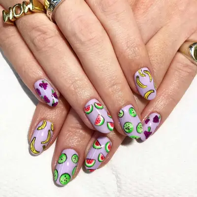 lavender nails with mixed fruit painted 