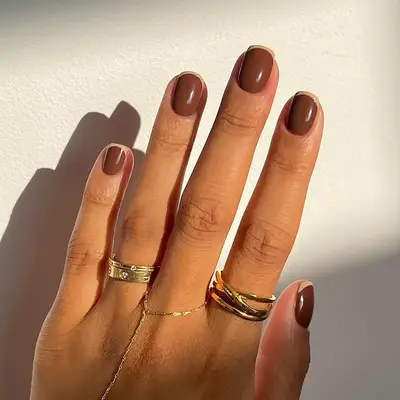 a brown and caramel french manicure