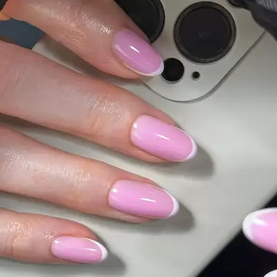 a jelly lavender manicure with milky lavender tips