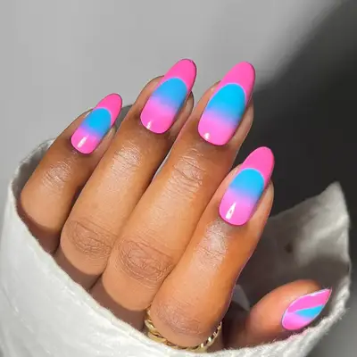a pink on blue ombre manicure