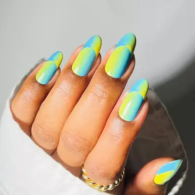 a green and blue french illusion manicure
