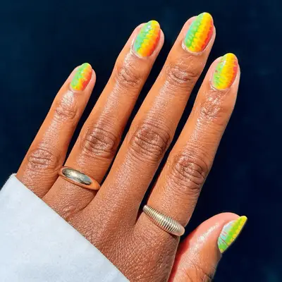 blue green yellow orange and red neon nails 