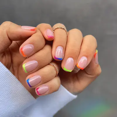 thin rainbow neon tips on short nails