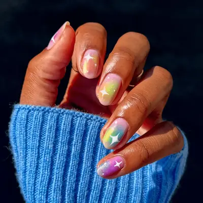 neon rainbow aura nails with star art